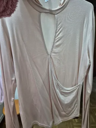 Camiseta cruzada color rosa clarito