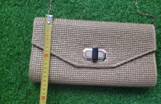 Bolso de fiesta dorado con cadena