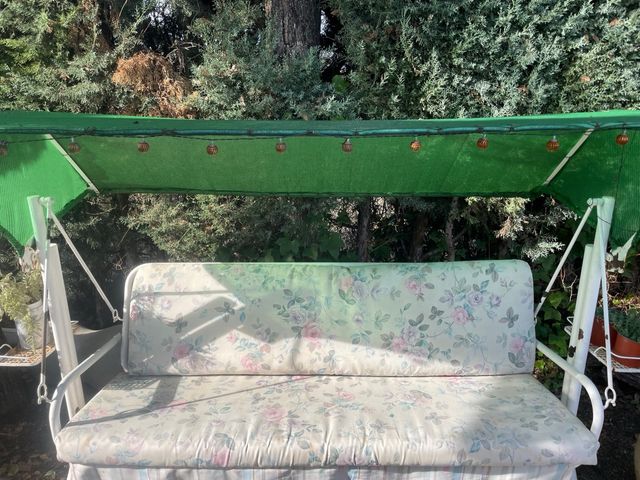 Columpio de jardín con cojines