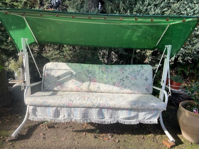 Columpio de jardín con cojines