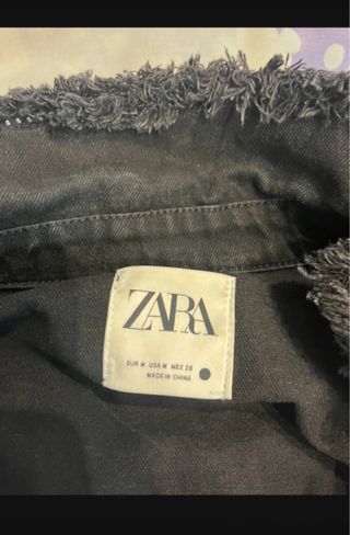 Chaqueta vaquera negra con flecos