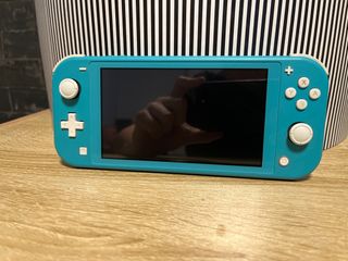 Nintendo Switch Lite Blue 32gb + caricabatterie ufficiale