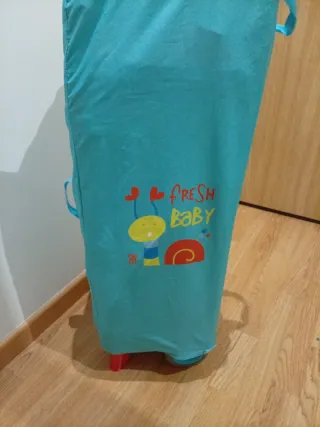 Cuna de viaje plegable con ruedas