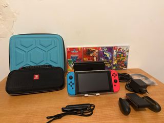 Nintendo Switch + 2 custodie + 4 giochi