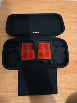 Nintendo Switch + 2 custodie + 4 giochi