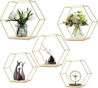 Set di cinque scaffali esagonali dorati