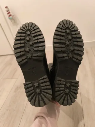 Botas altas negras con hebillas