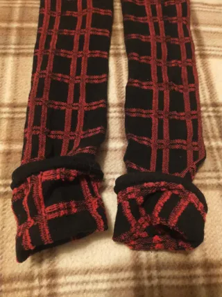 Scaldamuscoli a quadri neri e rosa