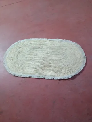 Tappeto ovale in juta fatto a mano