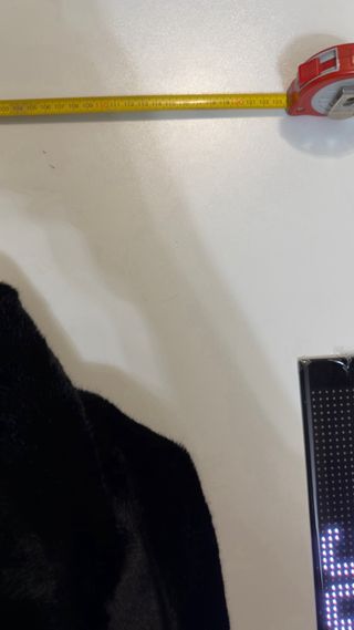 pelliccia sintetica nera nuova