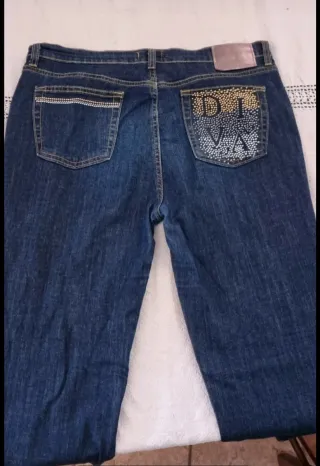 Jeans elasticizzati blu con strass