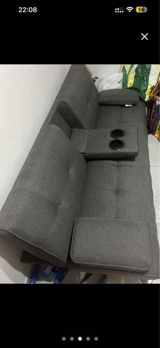 Sofá cama gris de tela