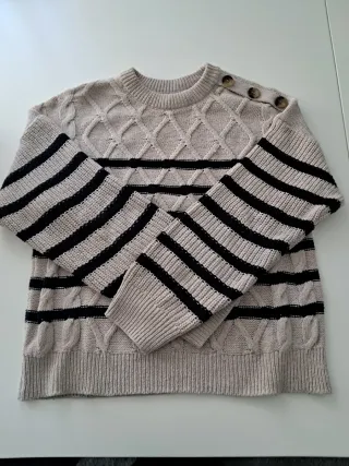 Jersey de punto beige y negro