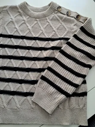 Jersey de punto beige y negro