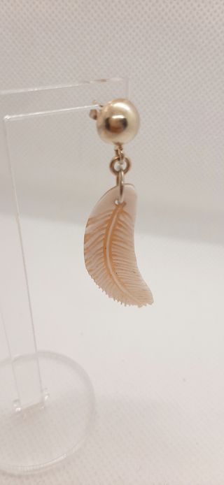 Orecchini pendenti a forma di piuma