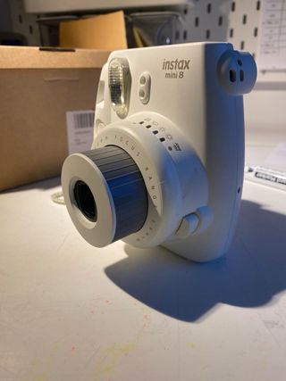 Cámara Instax Mini 8 Blanca con accesorios y funda