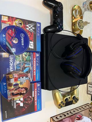 Playstation 4 slim + dos mandos + juegos