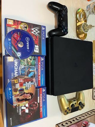 Playstation 4 slim + dos mandos + juegos
