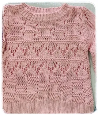 Jersey rosa tejido con detalles