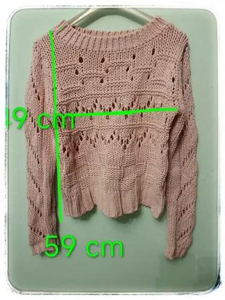 Jersey rosa tejido con detalles