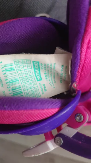 Patines niña Decathlon rosas y morados. Talla26-28