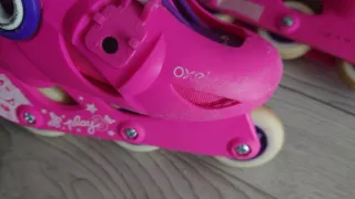 Patines niña Decathlon rosas y morados. Talla26-28