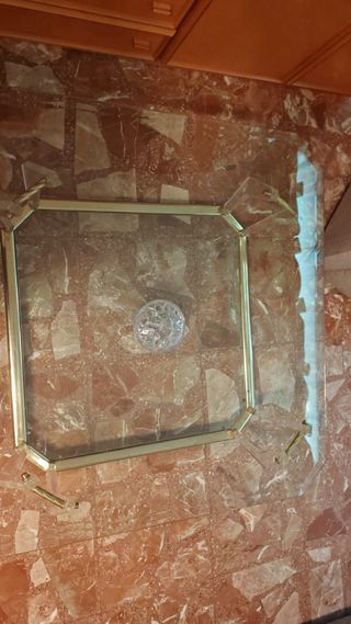 Mesa de centro cristal y metal dorado