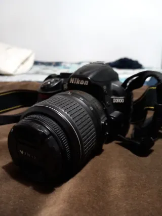 Cámara Nikon D3100 Negra + mochila +disparador+bat