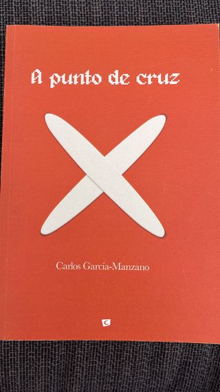 “A punto de cruz”