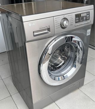 LAVADORA DE CARGA FRONTAL MARCA LG DE 7 KILOS INOX