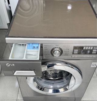 LAVADORA DE CARGA FRONTAL MARCA LG DE 7 KILOS INOX