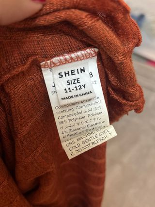 Top naranja de canalé con volantes