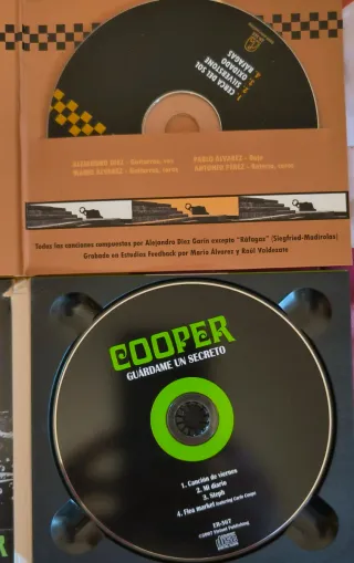 CDs Cooper "Oxidado" y "Guárdame un Secreto"