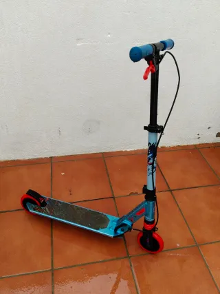 Patinete Oxelo azul y rojo