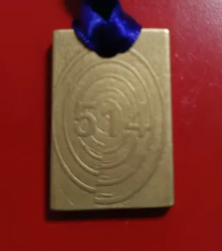 Plaquitas con secuencias numéricas de Grabovoi