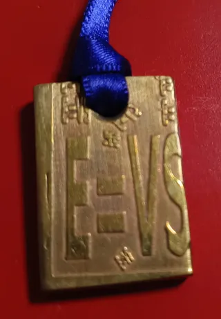 Plaquitas con secuencias numéricas de Grabovoi