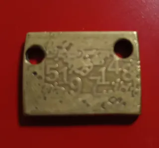 Plaquitas con secuencias numéricas de Grabovoi