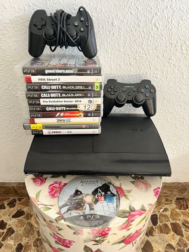 Consola PS3 Slim Nera + 10 Giochi + 2 Controller
