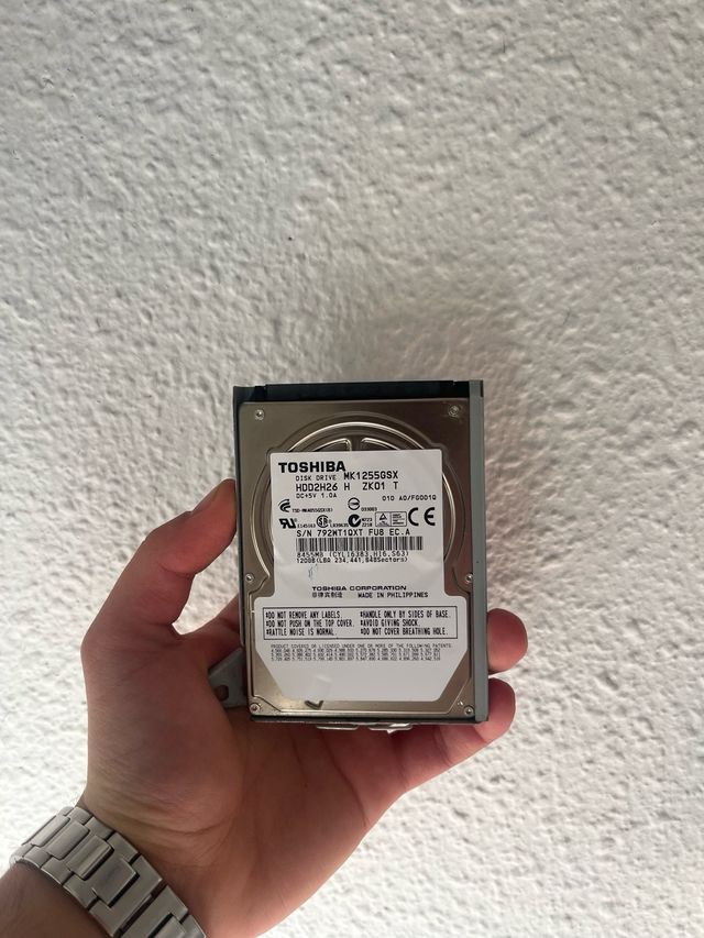 Consola PS3 Slim Nera + 10 Giochi + 2 Controller