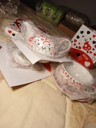 Conjunto tetera y vaso porcelana