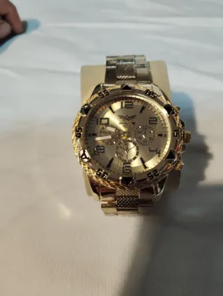 Reloj Dorado con Correa Plateada