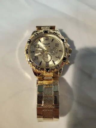 Reloj Dorado con Correa Plateada