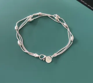 Pulsera tres cadenas plateadas