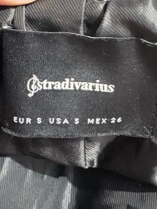 Chaqueta borrego negra y marrón