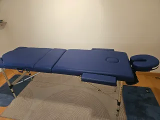 Camilla de masaje transportable. Sostiene 180kg.