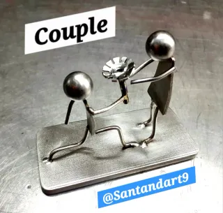 Figura pareja acero inoxidable