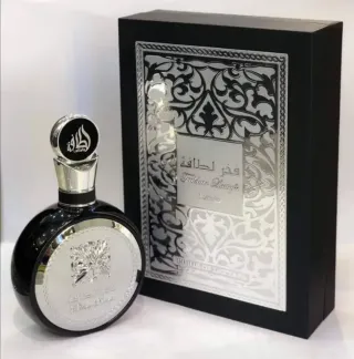 Perfume Fakhr Lattafa Negro y Plateado