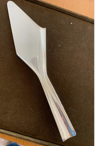 Christofle . Paletta torta Sabattini design.