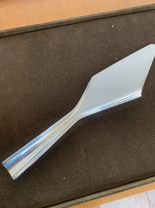 Christofle . Paletta torta Sabattini design.