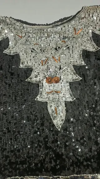 Top lentejuelas negro y plateado